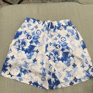 Louis Vuitton pool side shorts.